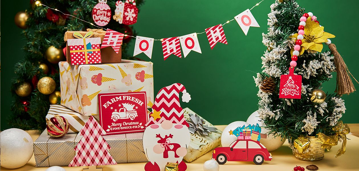 Christmas Decorations with Ho Ho banner wooden table centerpieces and Christmas gifts