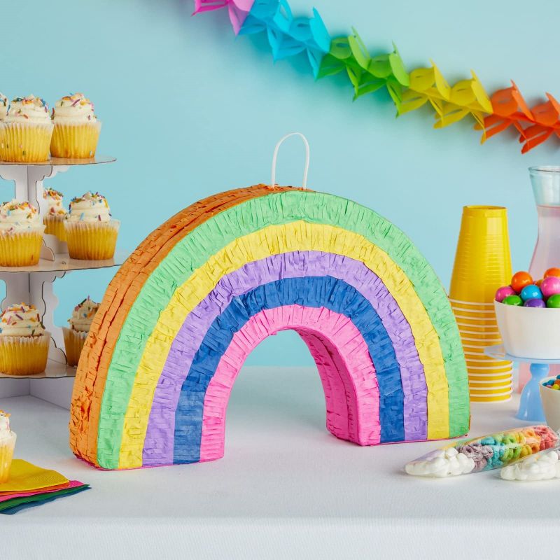 rainbow pinatas hanging
