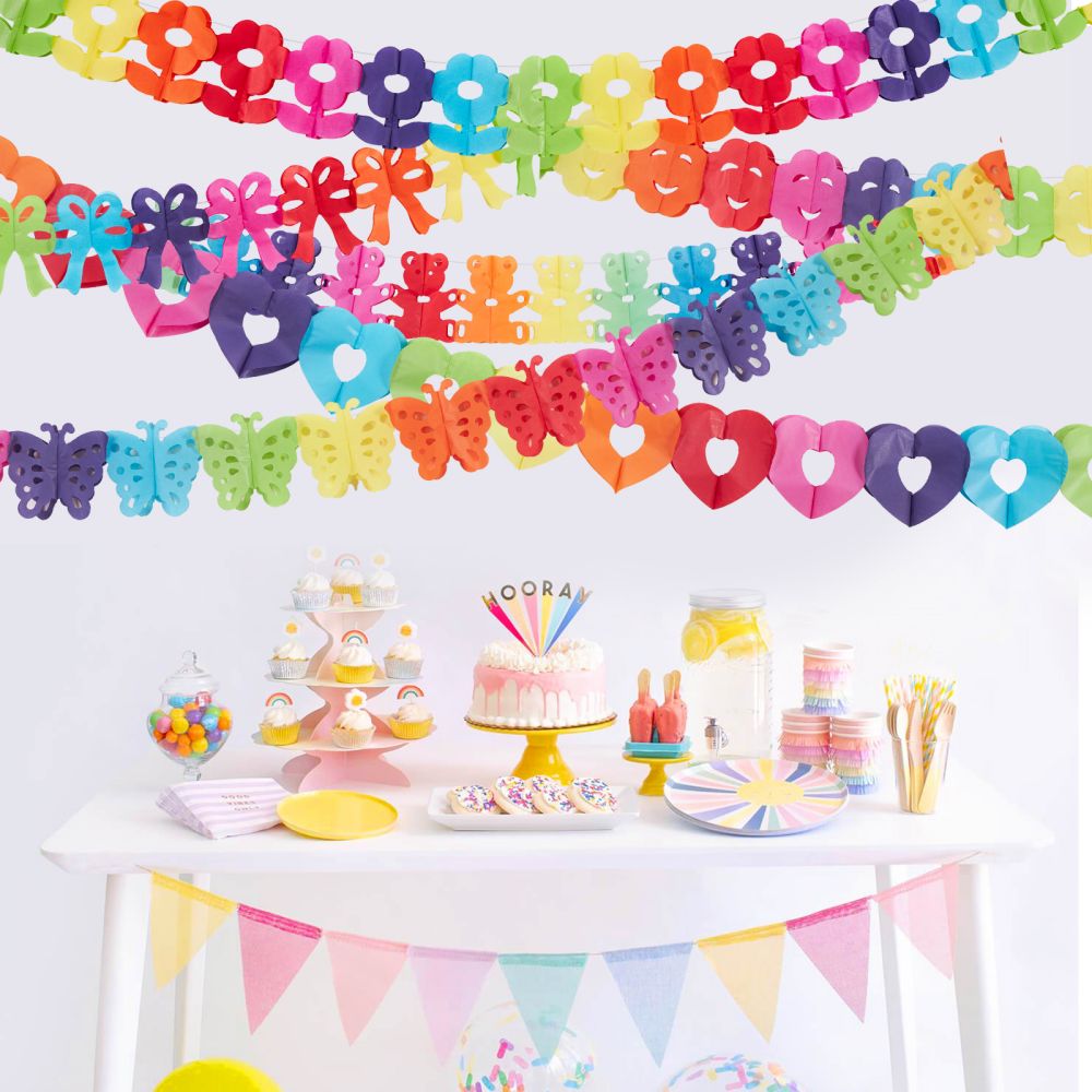 colorful paper decorations with paper garland and table decorations