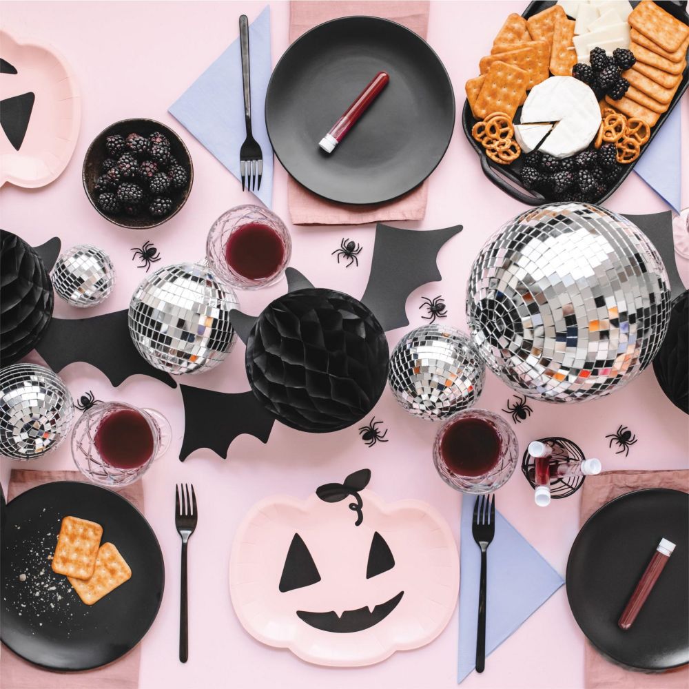 pink Halloween decorations with tableware set and bat decorations