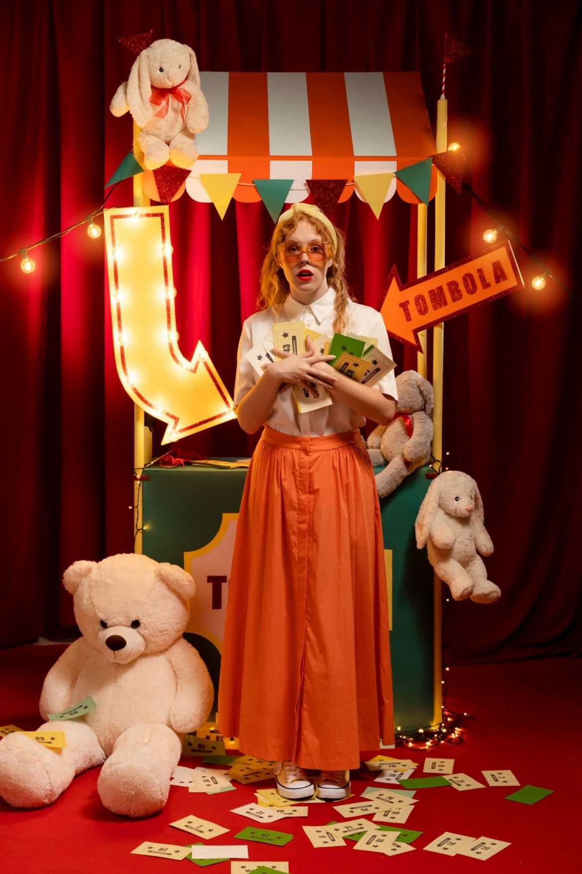 full shot woman holding tickets Circus Theme