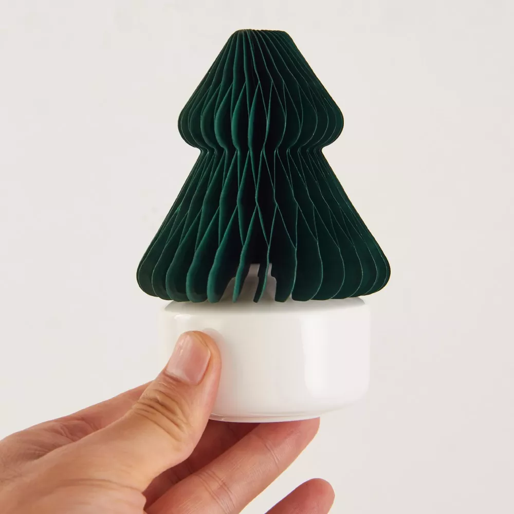 Partial assembly of the MUJI honeycomb-paper diffuser.