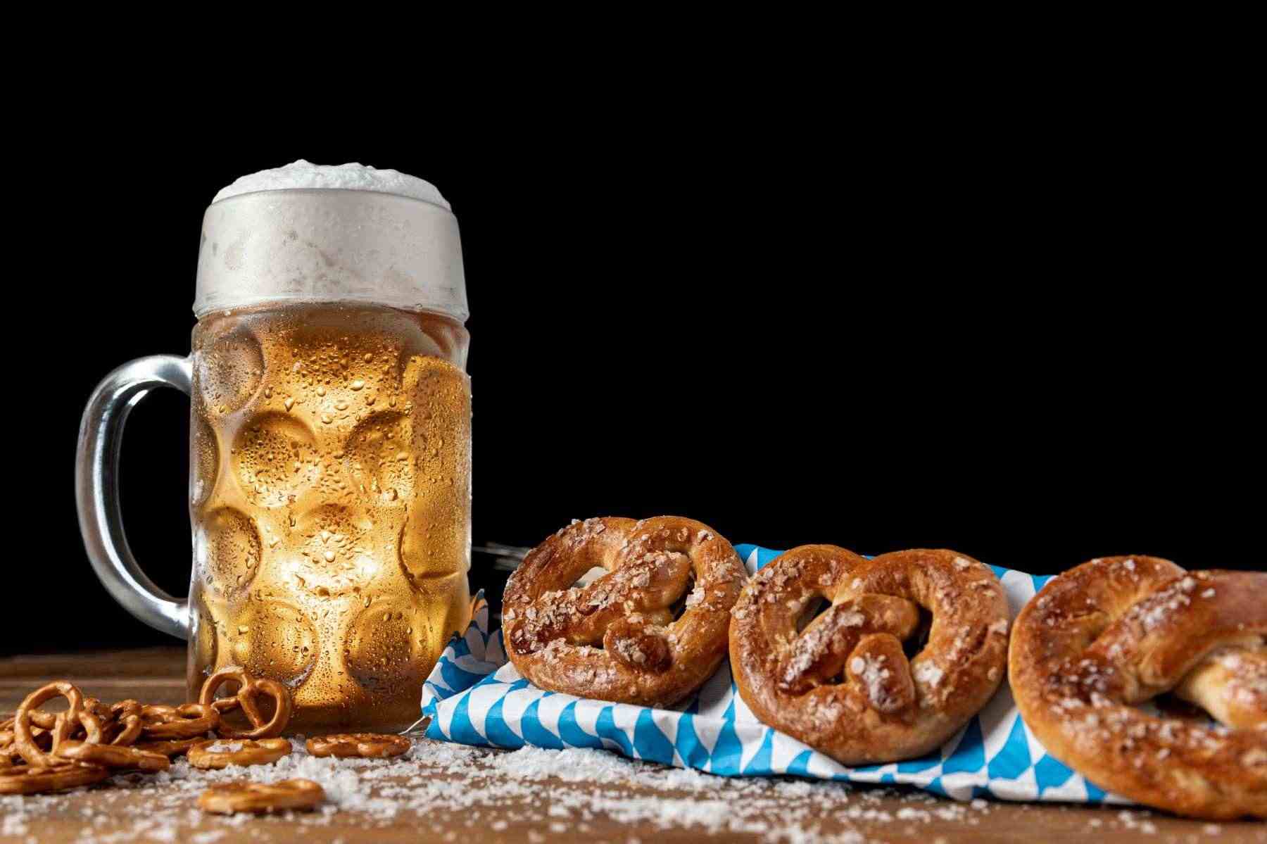 beer festival mug with pretzels table