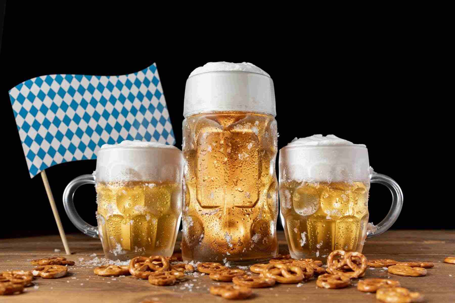 oktoberfest beer mugs with snacks table