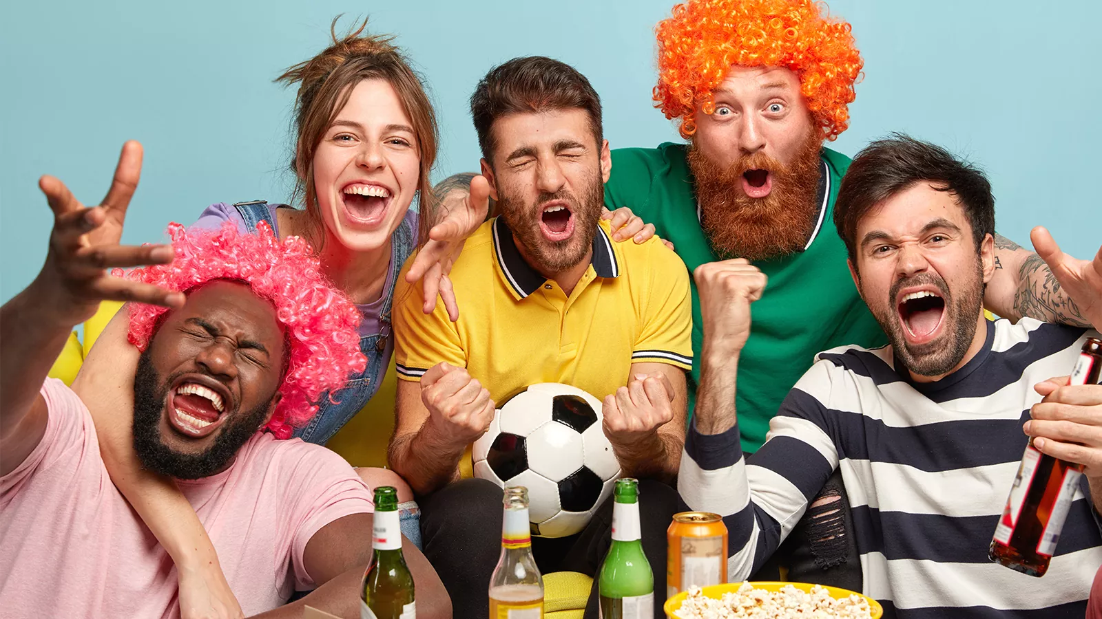 men woman fans watch football tv home enjoy exciting game clench fists celebrate victory