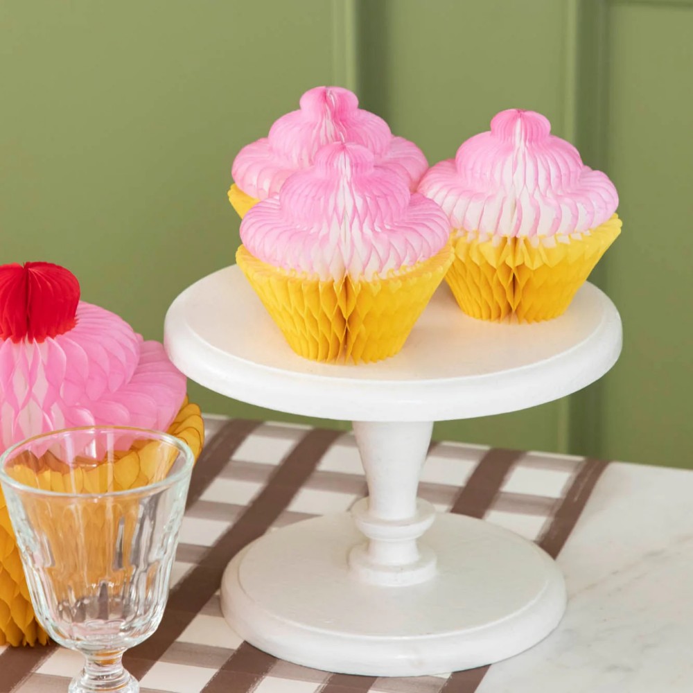 Honeycomb Small Cupcake Set of 3 on a cake pedestal, on a table.