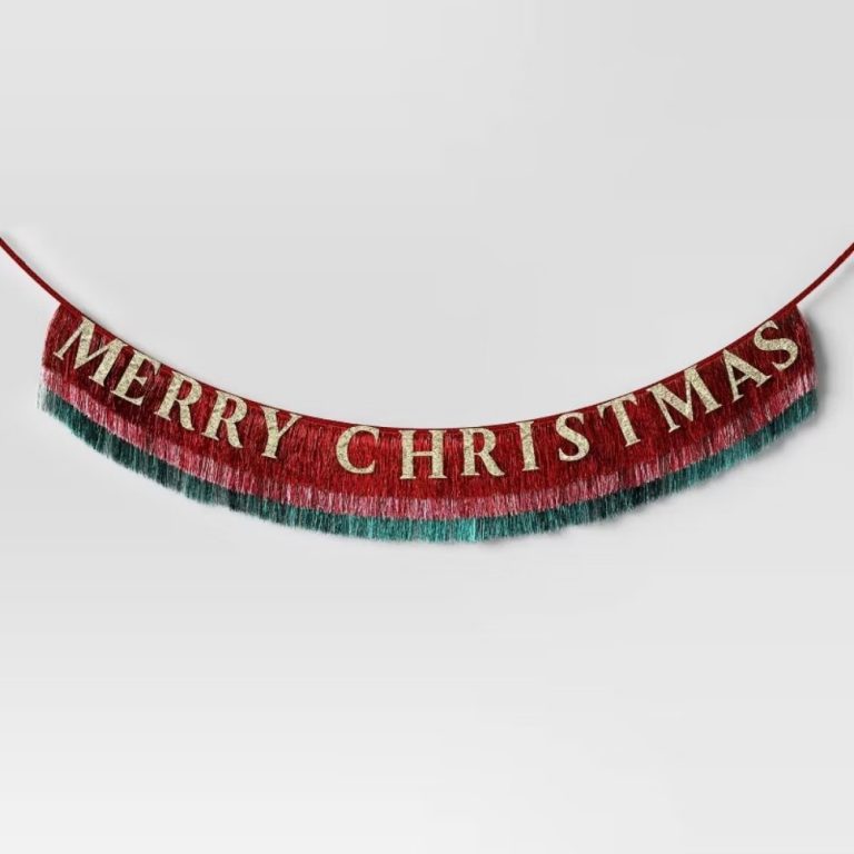 Red and green colored garland with gold colored letters spelling _MERRY CHRISTMAS