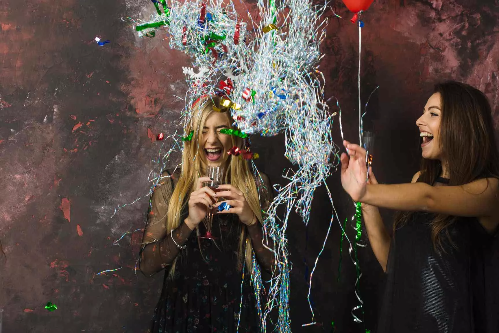 two happy girls celebrating divorce party