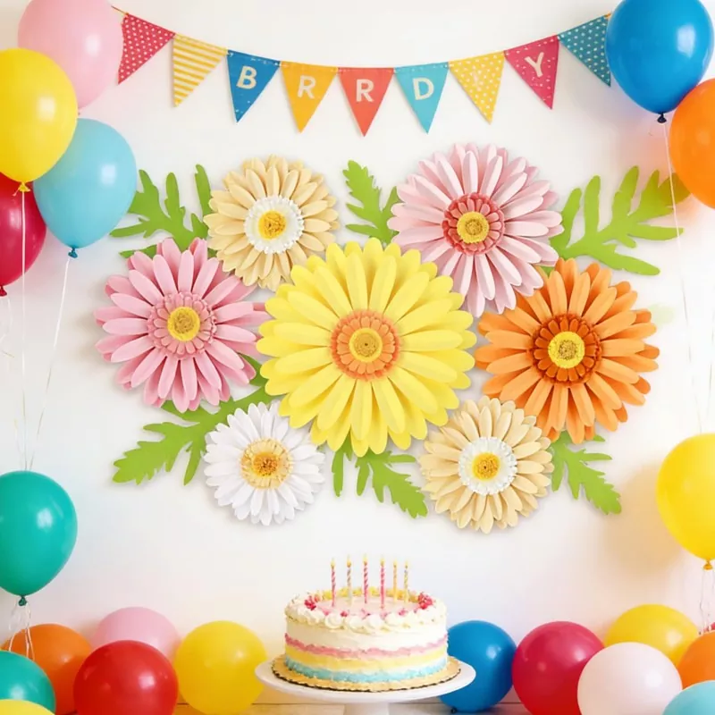 3D gerbera paper flowers birthday party backdrop with balloons and birthday cake