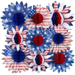 Assorted patriotic sunflower honeycomb paper flowers with US flag star and stripe patterns, isolated flat lay product photo