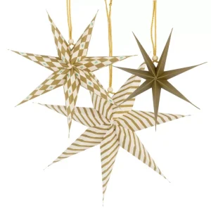 Gold and white patterned hanging paper star decorations closeup