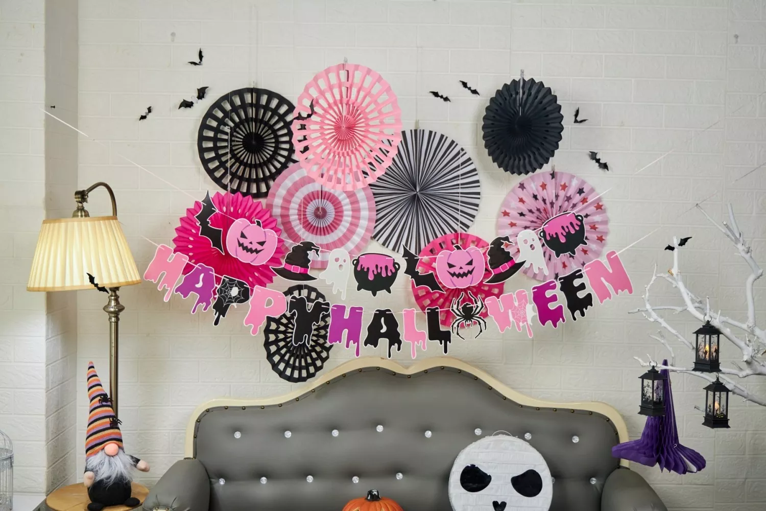 Pink Halloween party decor set with banner and paper fans