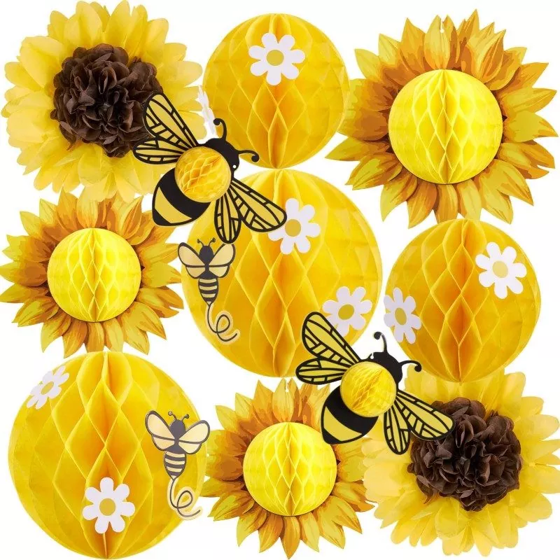 Sunflower bee honeycomb paper party decor set, isolated studio product flat‑lay